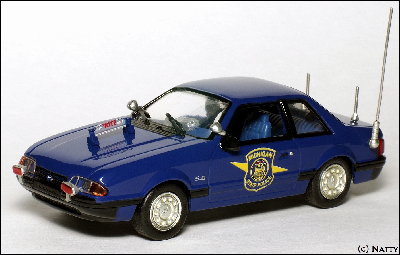 White Rose Collectibles: 1991 Ford Mustang Michigan State Police (DEDF99084WMI) in 1:43scale